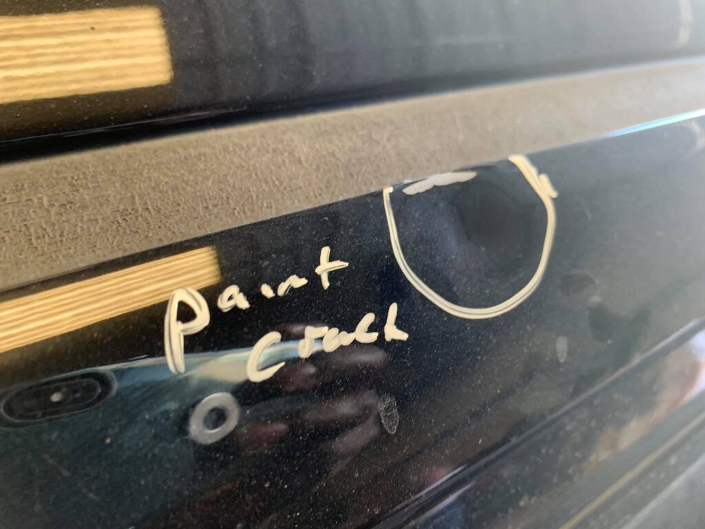 Black Ford XLT Paint Crack Auto Body Work